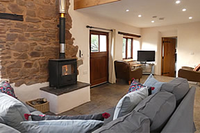 Comfortable sofa and woodburner stove
